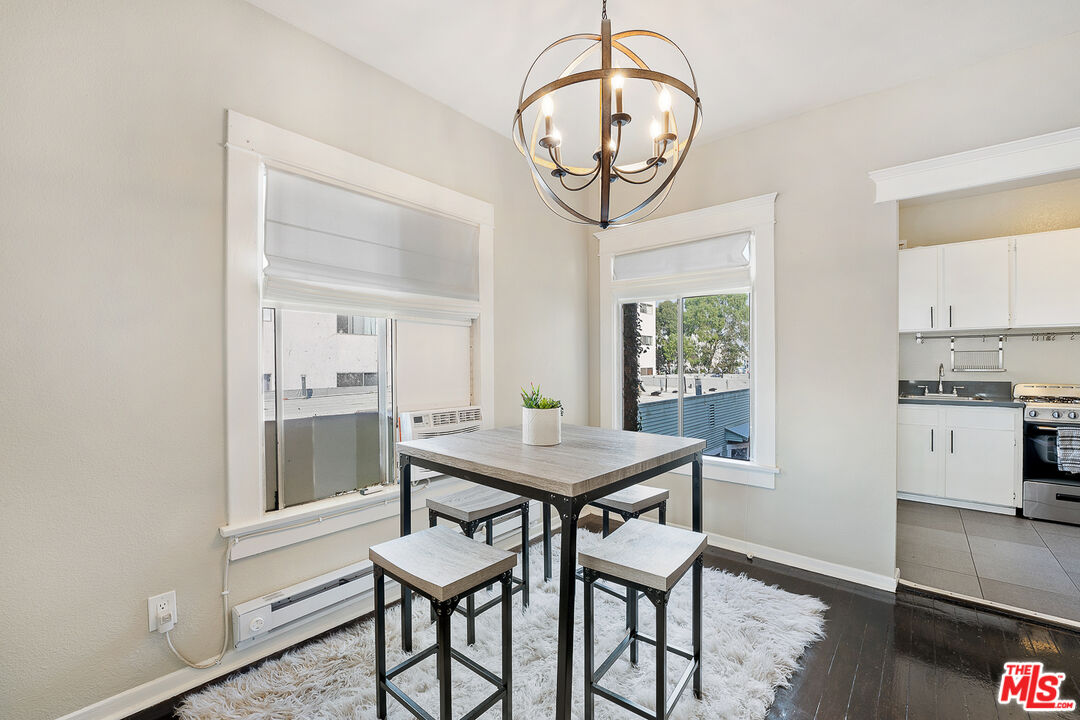 330 Cedar Avenue Long Beach, CA 90802 - Photo 10 of 18 a view of a dining room with furniture window and wooden floor