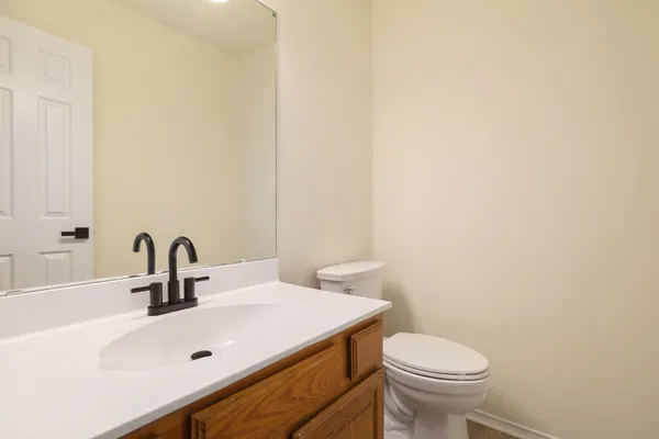a bathroom with a sink and a toilet