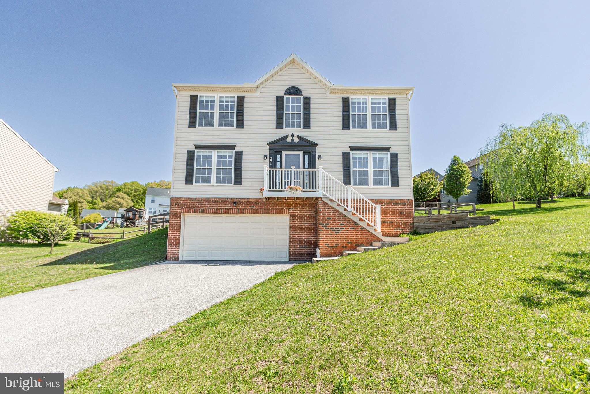 271 Courtney Court Spring Grove, PA 17362 - Photo 2 of 51 a front view of a house with garden