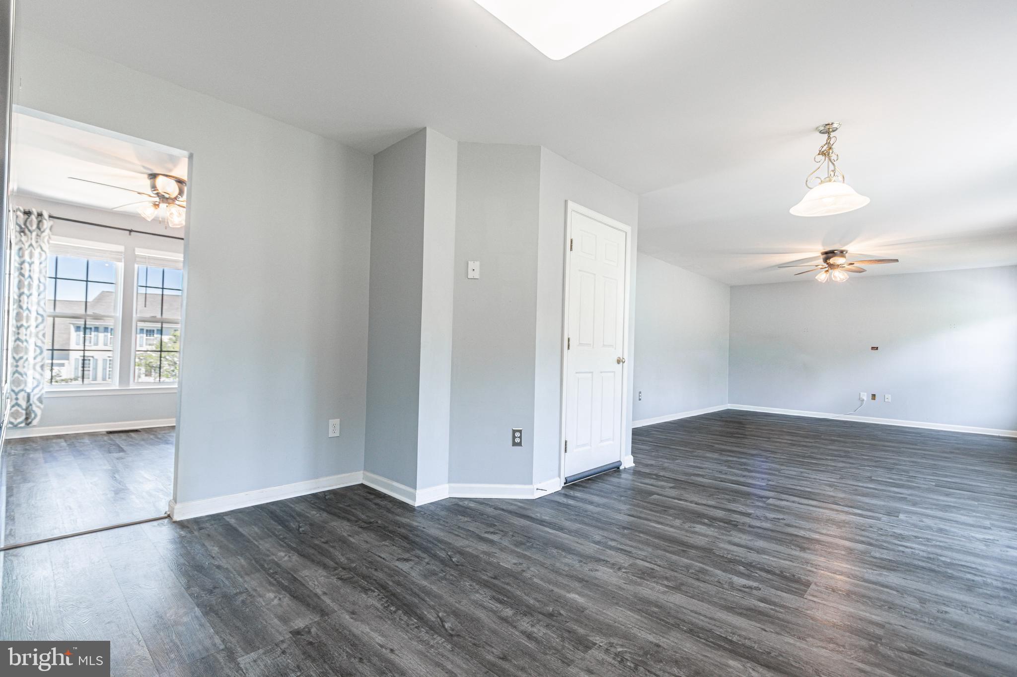 271 Courtney Court Spring Grove, PA 17362 - Photo 26 of 51 an empty room with wooden floor and windows