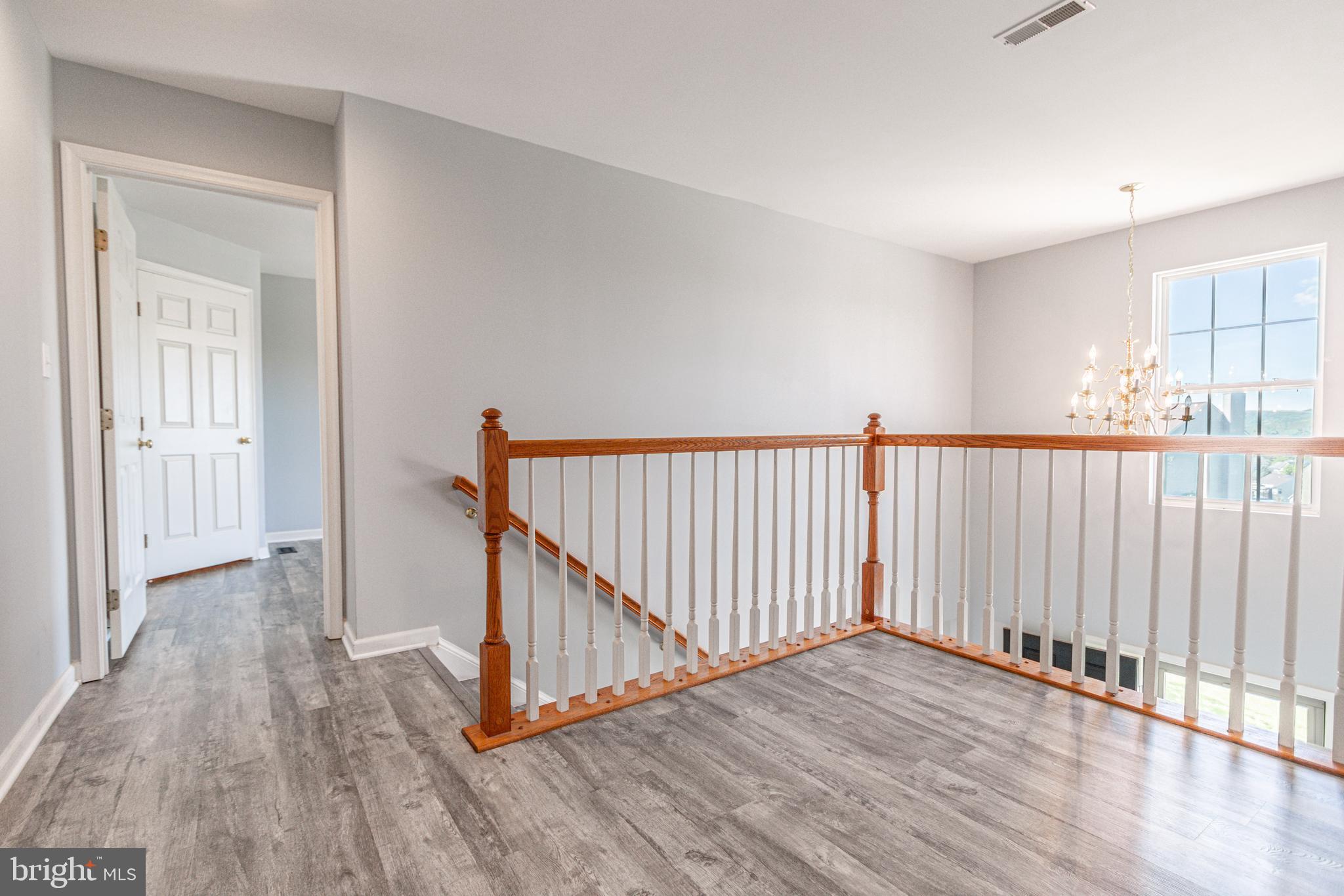 271 Courtney Court Spring Grove, PA 17362 - Photo 28 of 51 a view of a hallway with wooden floor