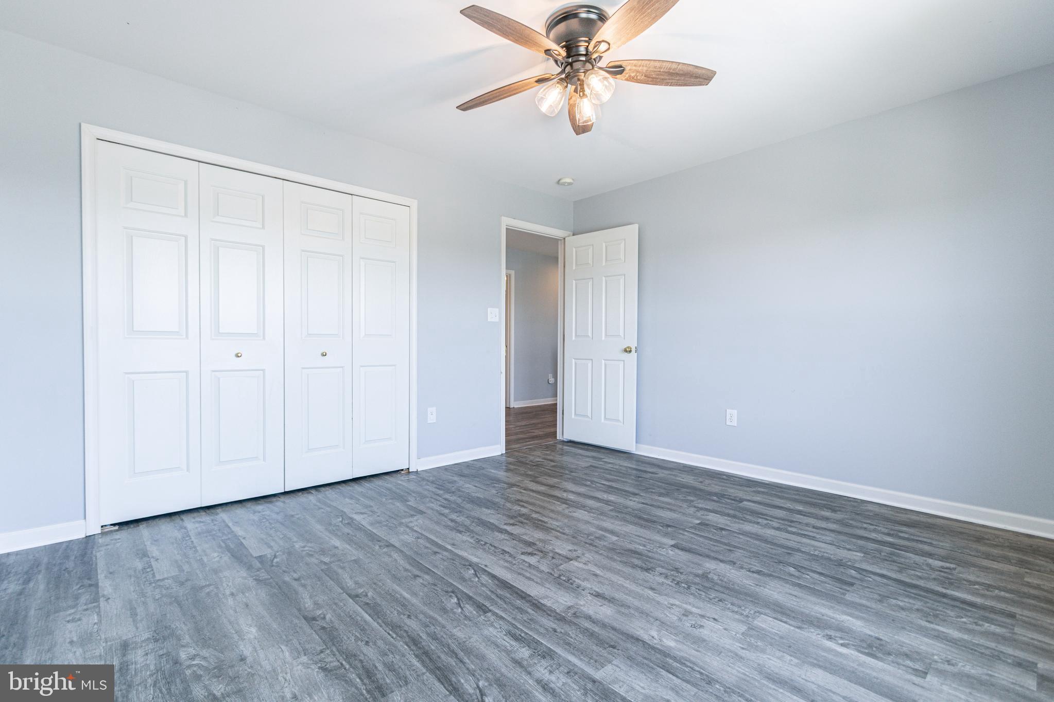 271 Courtney Court Spring Grove, PA 17362 - Photo 32 of 51 a view of an empty room with wooden floor