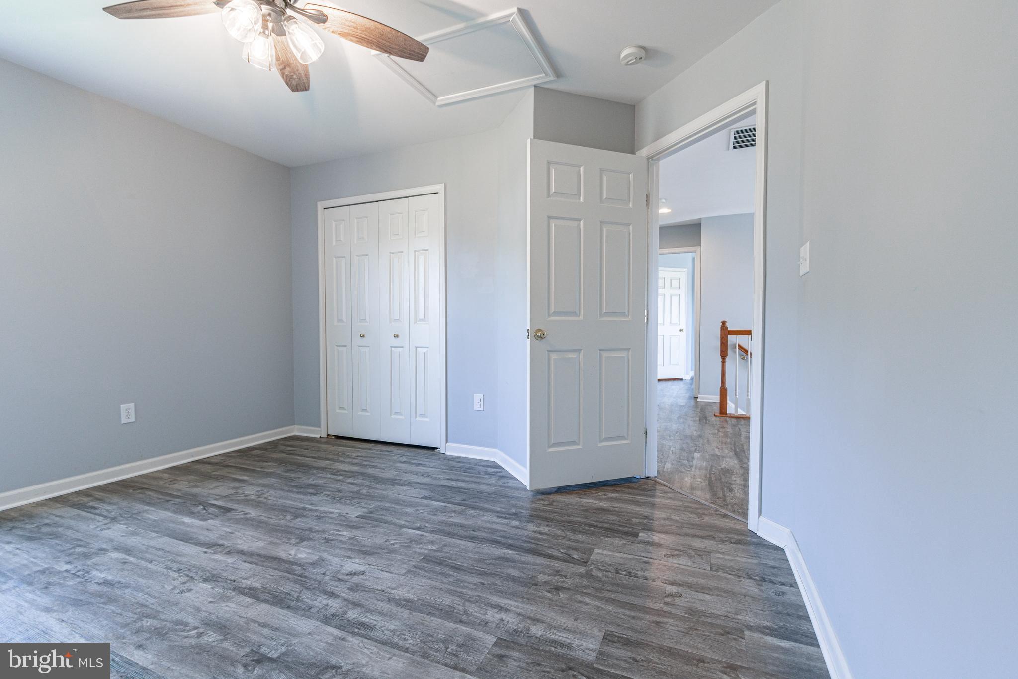 271 Courtney Court Spring Grove, PA 17362 - Photo 34 of 51 wooden floor in an empty room with a window