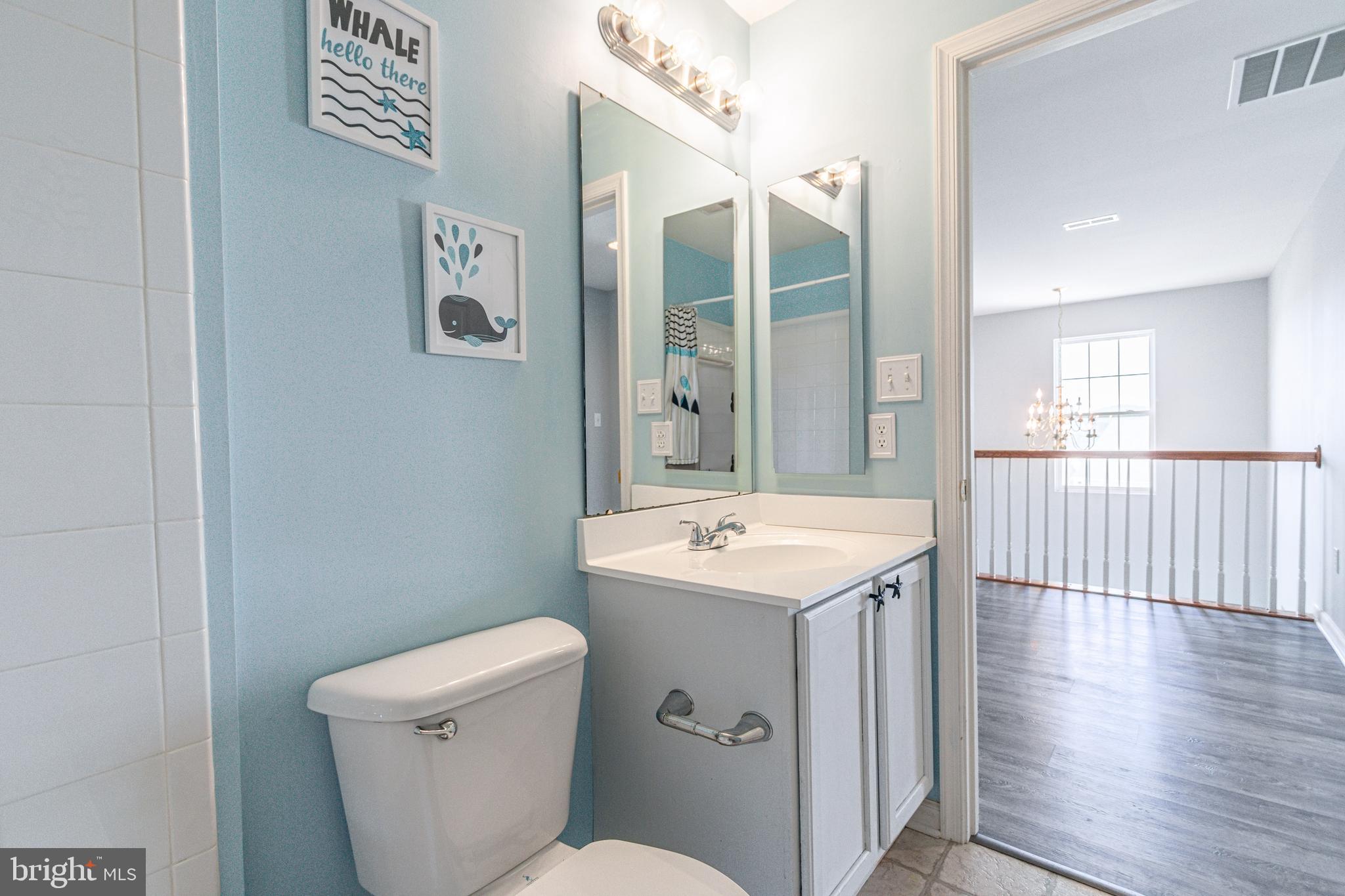 271 Courtney Court Spring Grove, PA 17362 - Photo 37 of 51 a view of bathroom with a toilet sink and mirror