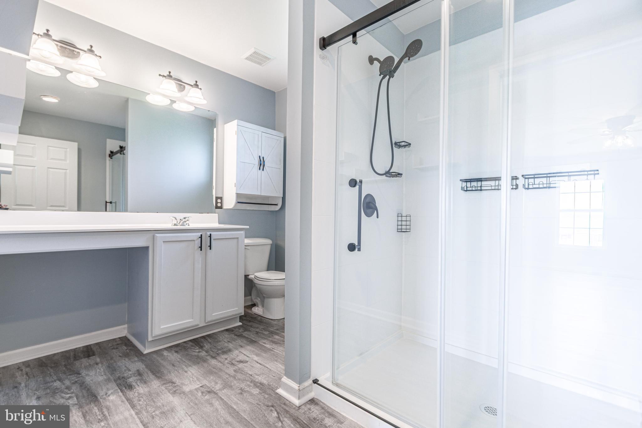 271 Courtney Court Spring Grove, PA 17362 - Photo 43 of 51 a bathroom with a double vanity sink mirror and shower