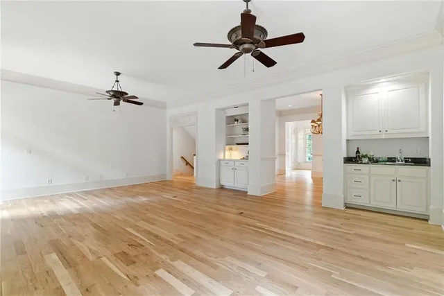 a view of a room with windows and a chandelier