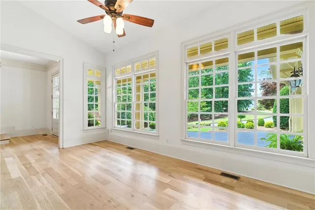 a view of a house with porch and wooden floor