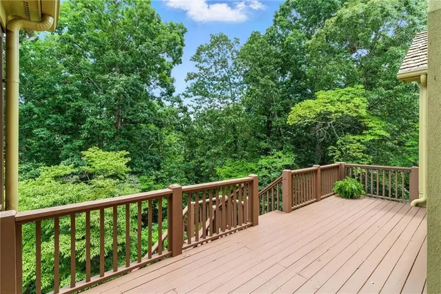 a room with pool tables and windows