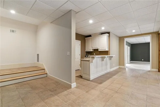a view of a deck with a wooden fence