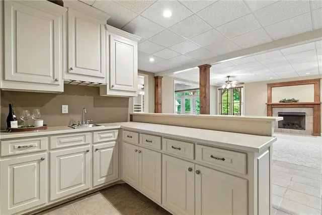 a view of a patio with table and chairs with wooden floor