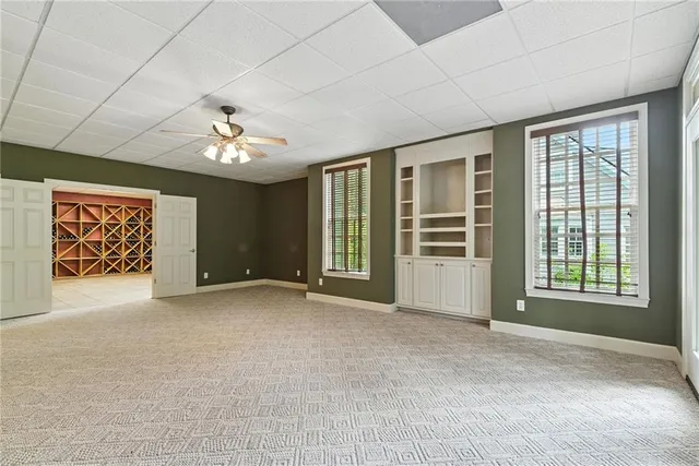 an aerial view of a house with a garden