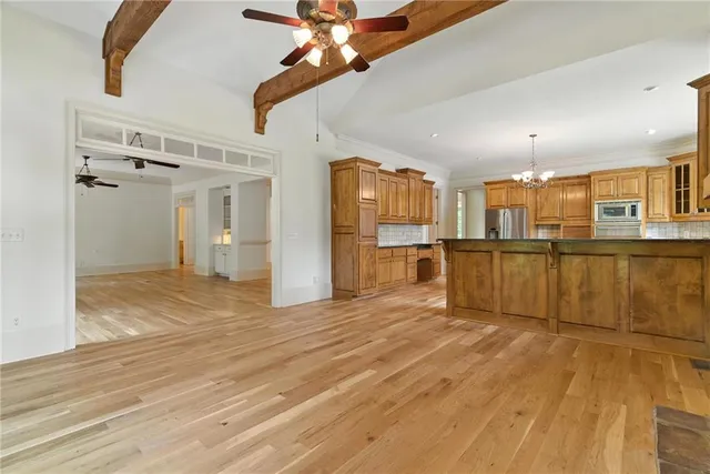a view of cabinets and wooden floor