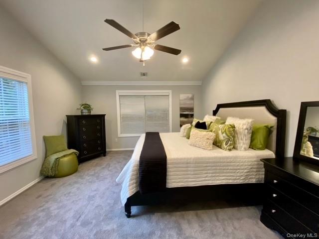 24 Neal Path, Unit 24 Centereach, NY 11720 - Photo 6 of 10 a bedroom with a bed and dresser