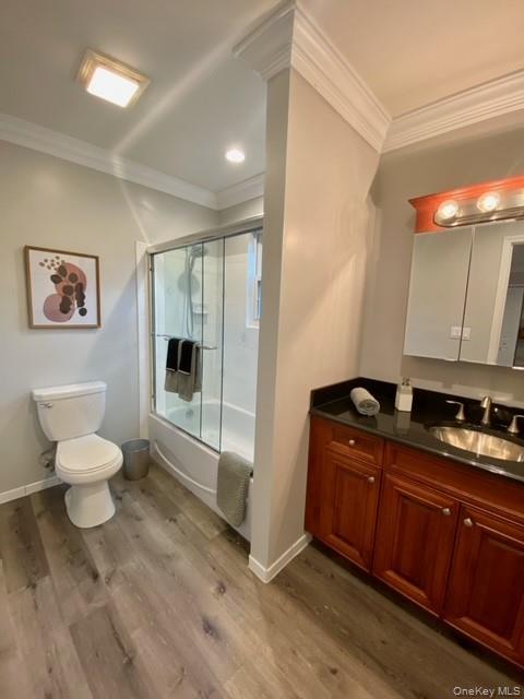 24 Neal Path, Unit 24 Centereach, NY 11720 - Photo 10 of 10 a bathroom with a toilet sink and mirror