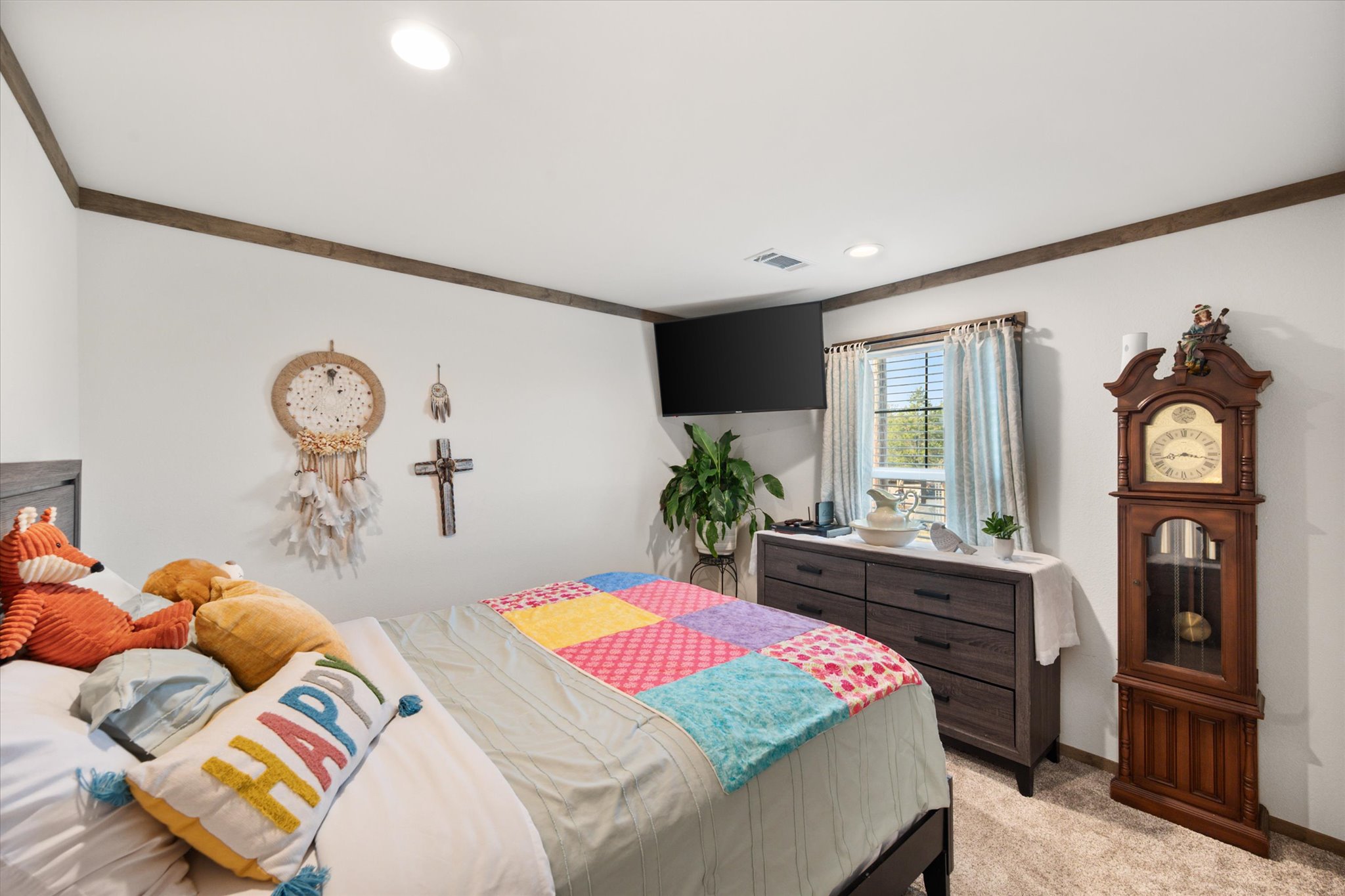 16857 Fm 639 Road East Purdon, TX 76679 - Photo 30 of 38 Bedroom featuring crown molding, light carpet, and recessed lighting