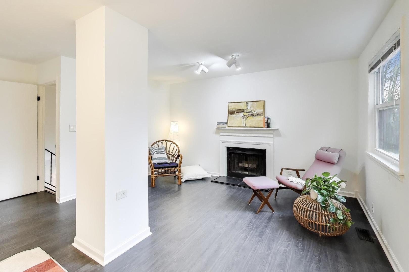 1011 Wesley Lane Algonquin, IL 60102 - Photo 16 of 24 a living room with furniture and a fireplace