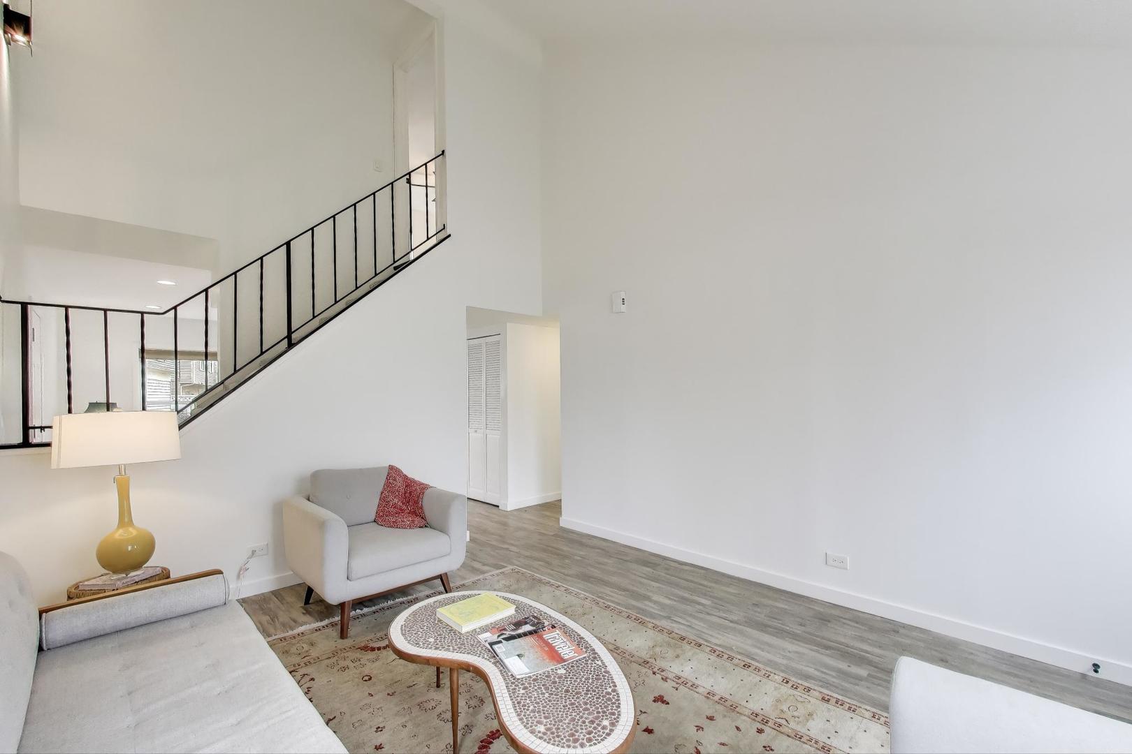 1011 Wesley Lane Algonquin, IL 60102 - Photo 4 of 24 a living room with couches and a rug