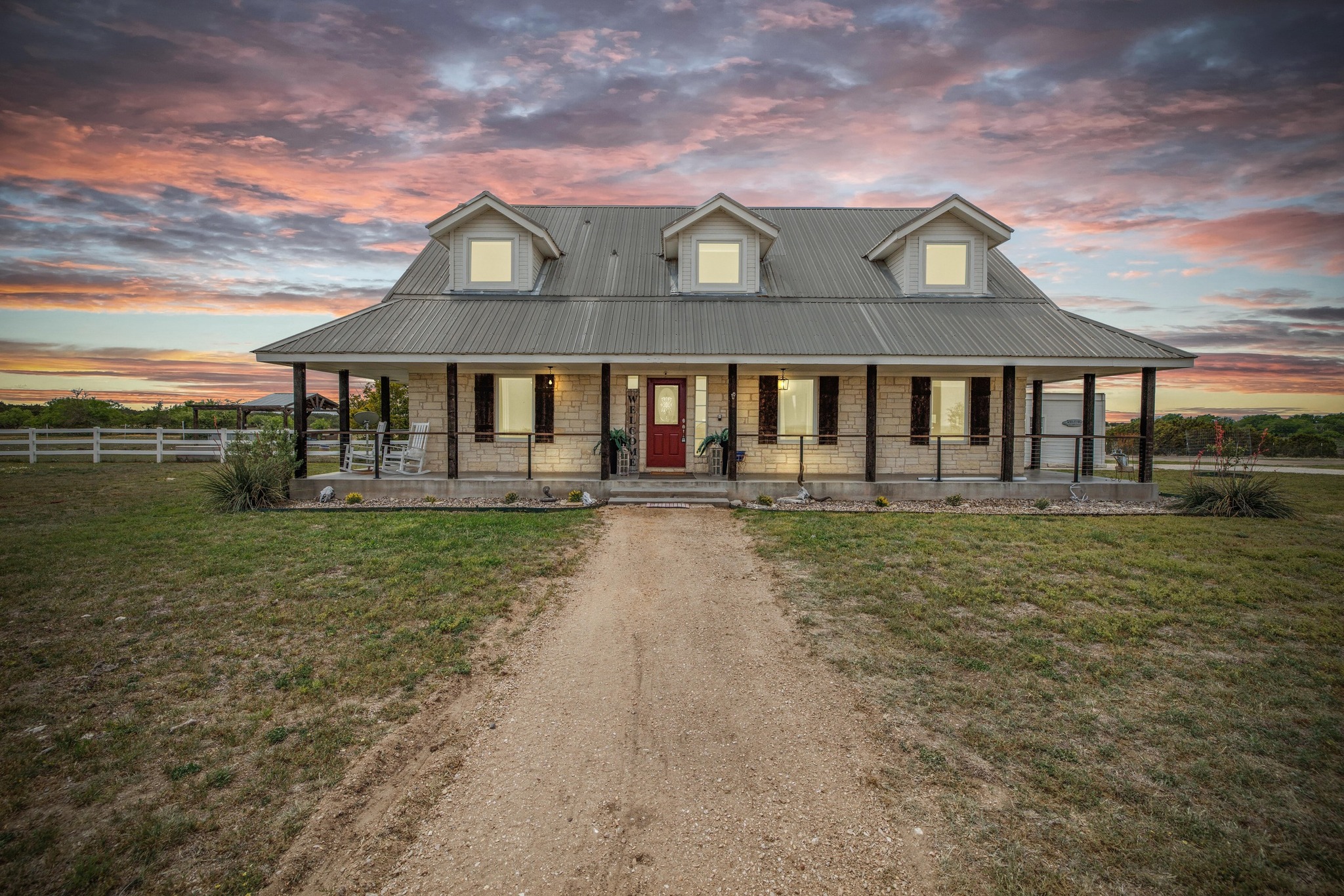1283 Rattlesnake Trail Burnet, TX 78611 - Photo 2 of 40 front view of a house with a yard
