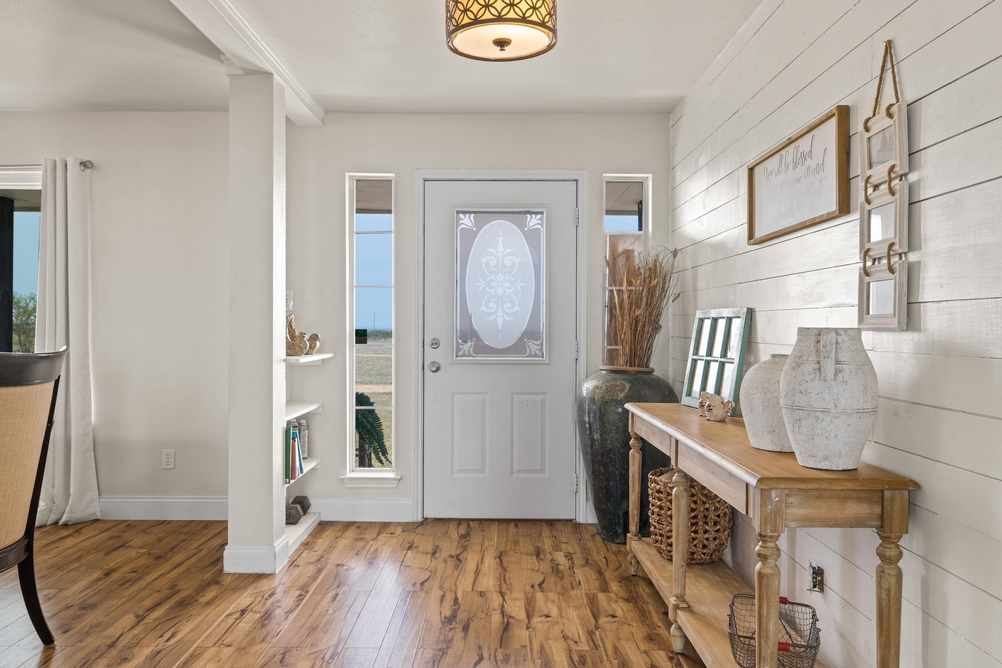 1283 Rattlesnake Trail Burnet, TX 78611 - Photo 4 of 40 a view of an entryway with wooden floor