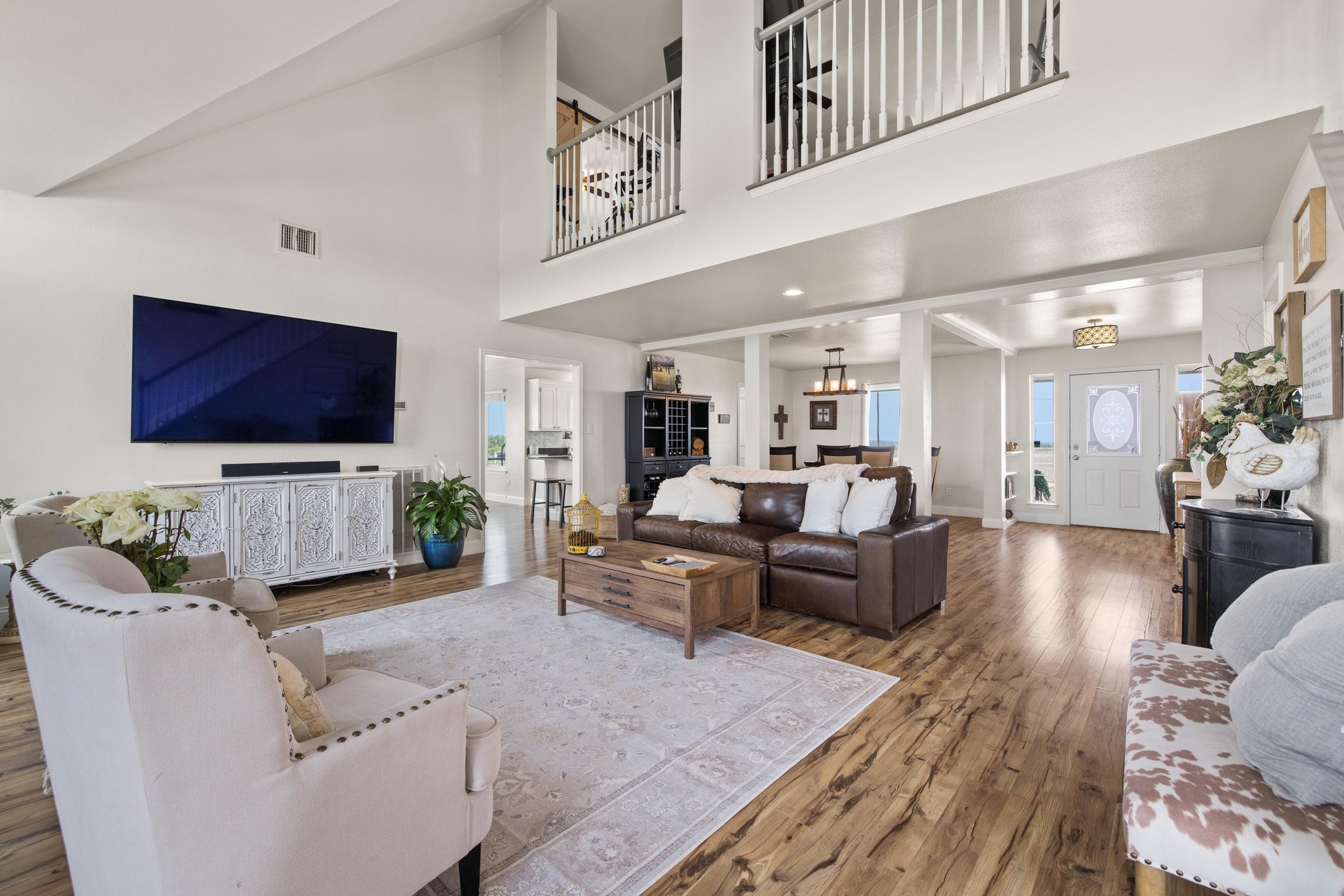 1283 Rattlesnake Trail Burnet, TX 78611 - Photo 7 of 40 a living room with furniture and a flat screen tv