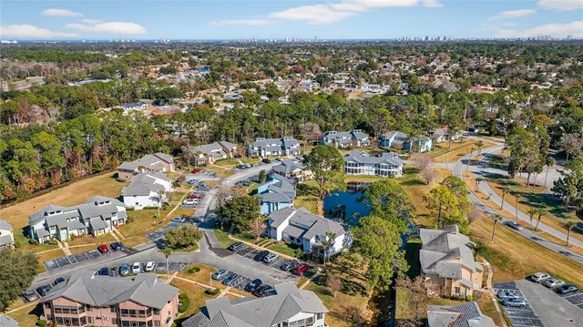 an aerial view of residential building with outdoor space