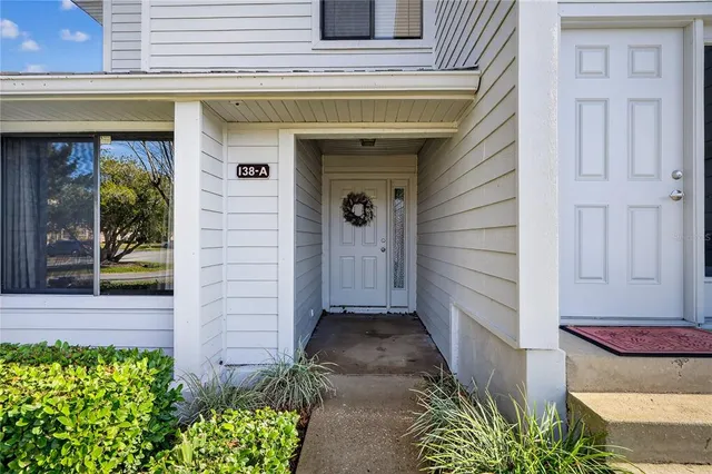 a house view with a garden space