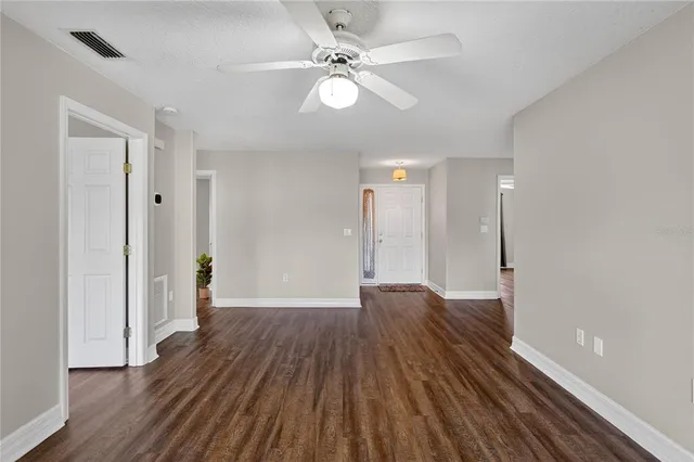 a view of a livingroom with wooden floor