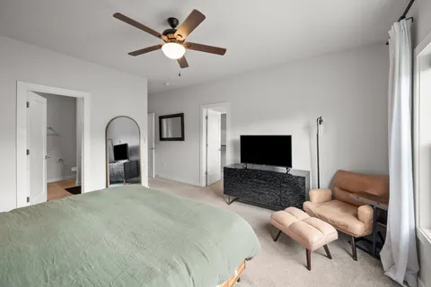 a bathroom with a sink a double vanity and shower