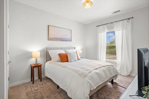 a view of a house with a street