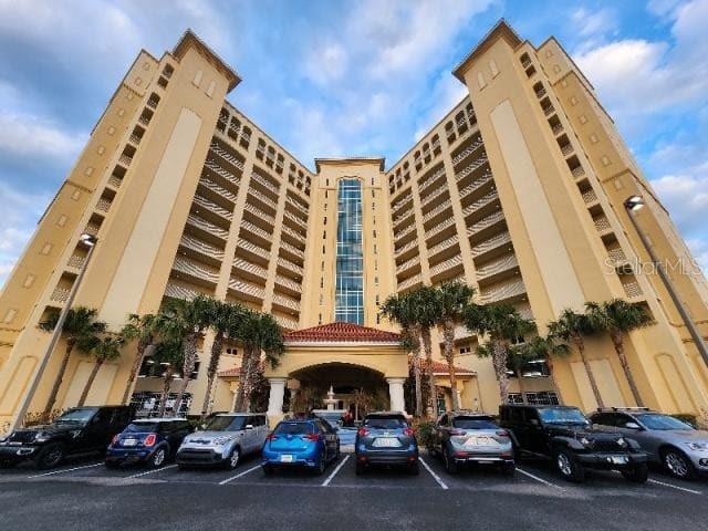 2801 South Ridgewood Avenue, Unit 403 South Daytona, FL 32119 - Photo 1 of 16 a view of a car parked in front of a building