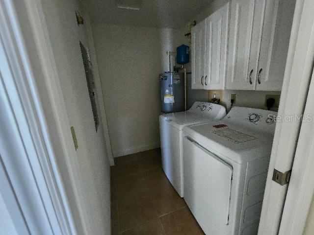 2801 South Ridgewood Avenue, Unit 403 South Daytona, FL 32119 - Photo 11 of 16 a utility room with dryer and washer