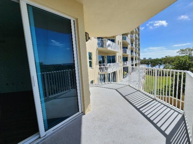 2801 South Ridgewood Avenue, Unit 403 South Daytona, FL 32119 - Photo 13 of 16 a view of balcony with furniture