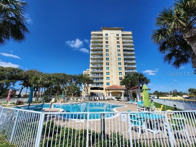 2801 South Ridgewood Avenue, Unit 403 South Daytona, FL 32119 - Photo 15 of 16 a view of building with outdoor space
