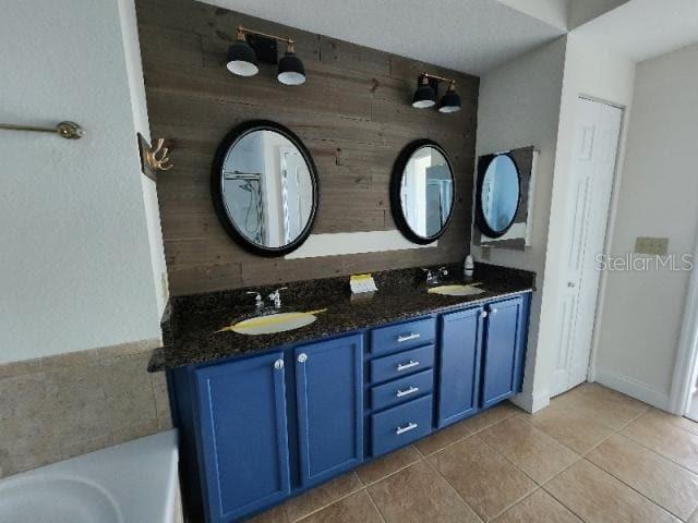 2801 South Ridgewood Avenue, Unit 403 South Daytona, FL 32119 - Photo 8 of 16 a bathroom with a sink and a mirror