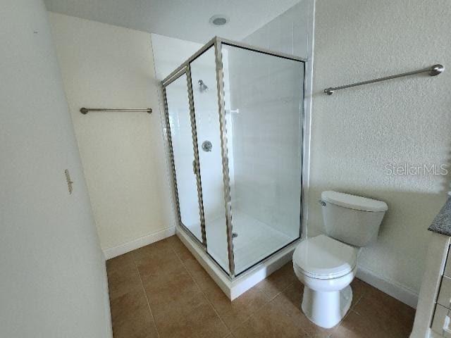2801 South Ridgewood Avenue, Unit 403 South Daytona, FL 32119 - Photo 10 of 16 a bathroom with a shower and a toilet
