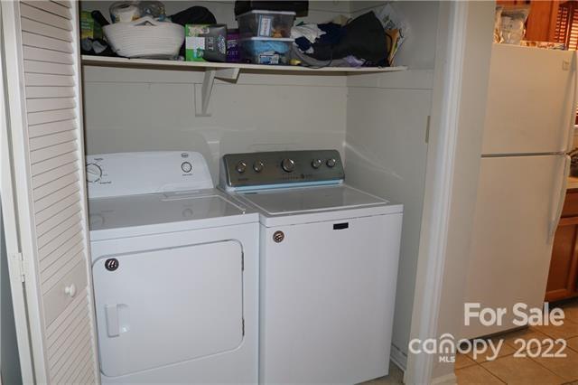 11007 Running Ridge Road Charlotte, NC 28226 - Photo 33 of 38 a utility room with dryer and washer
