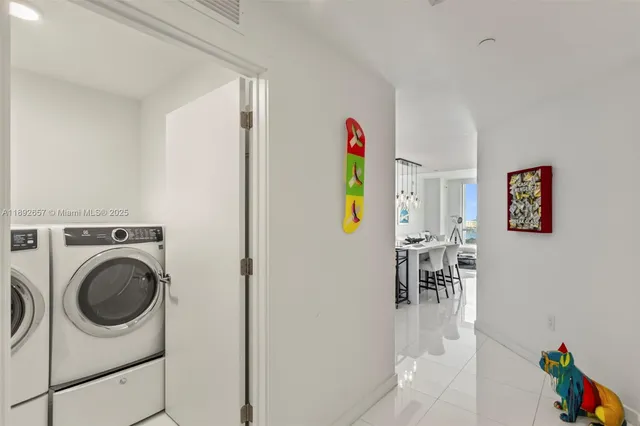 a view of a livingroom with furniture and a gate