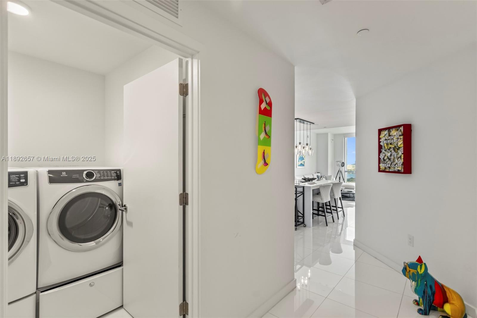 851 Northeast 1st Avenue, Unit 3707 Miami, FL 33132 - Photo 24 of 28 a view of a livingroom with furniture and a gate