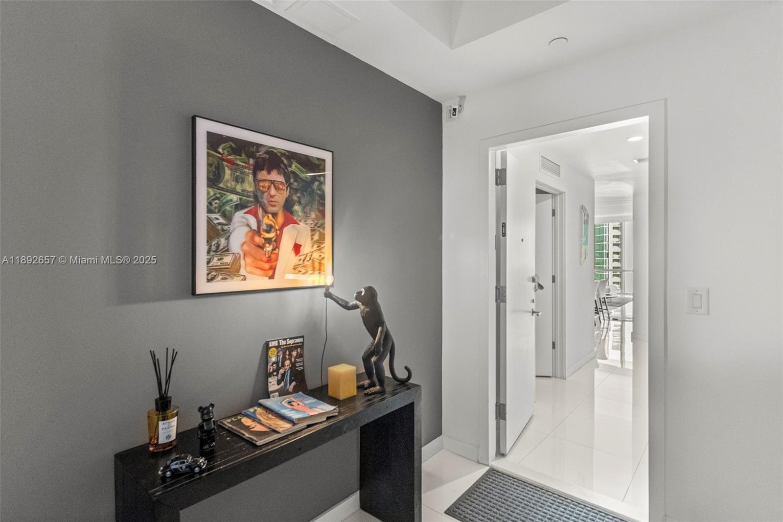 851 Northeast 1st Avenue, Unit 3707 Miami, FL 33132 - Photo 25 of 28 a view of a hallway with workspace