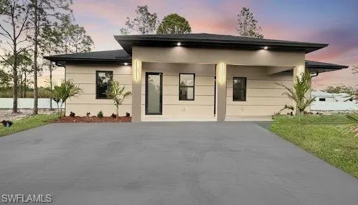 a view of a house with a outdoor space