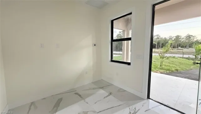 an empty room with window