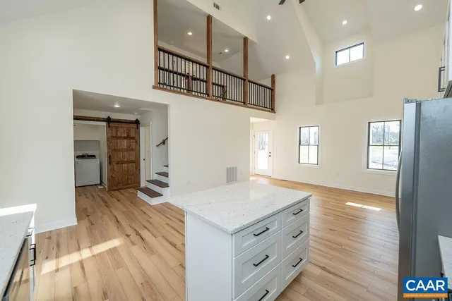 a bathroom with a sink a vanity and a mirror