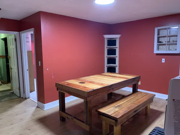 a view of a livingroom with furniture