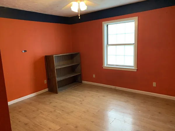 an empty room with a window