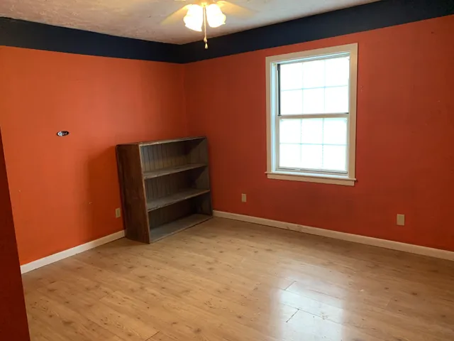 an empty room with a window