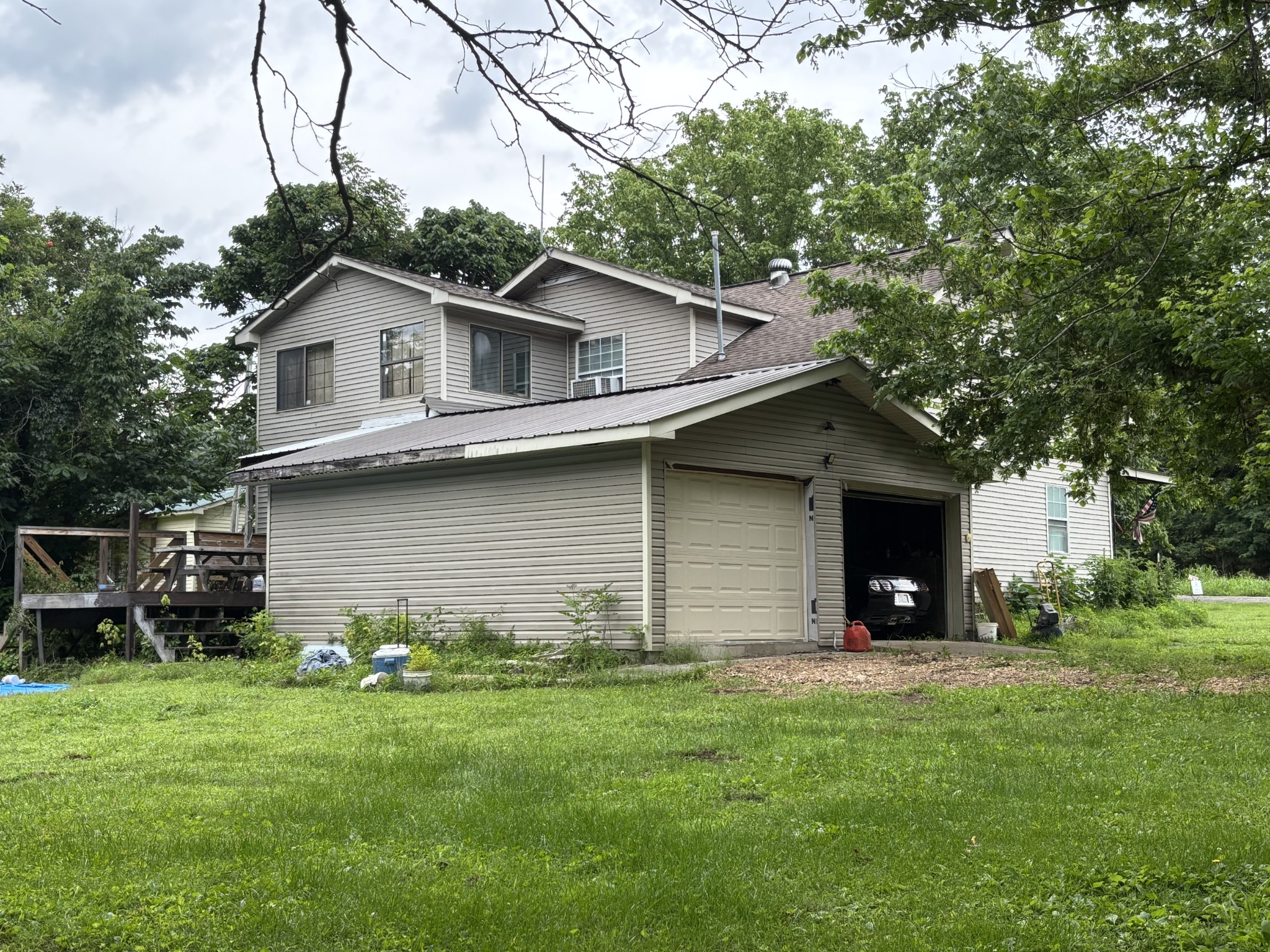 502 Twomey Road Centerville, TN 37033 - Photo 30 of 42 a front view of house with yard and trees