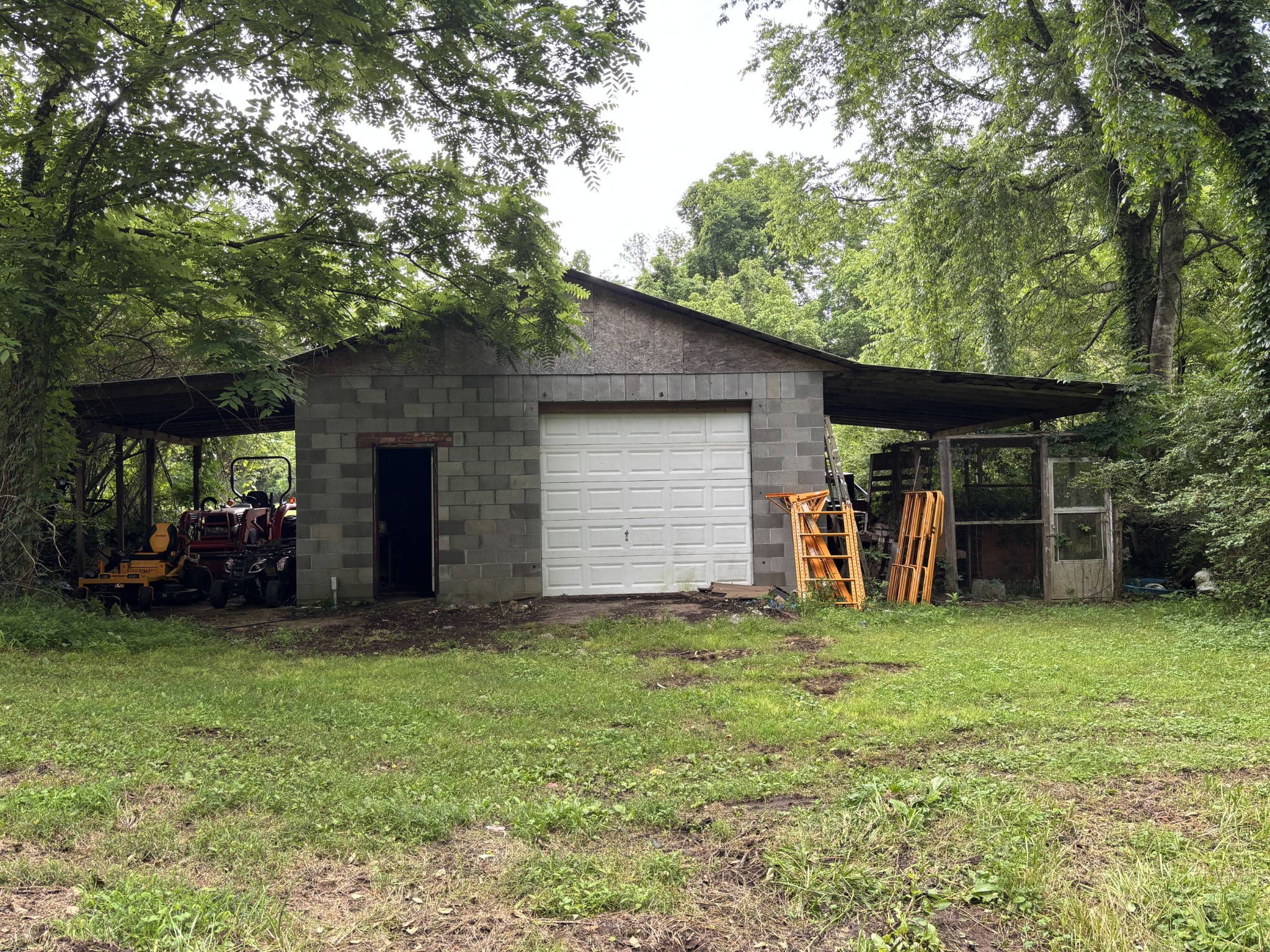 502 Twomey Road Centerville, TN 37033 - Photo 31 of 42 a view of a chair and table in backyard of the house