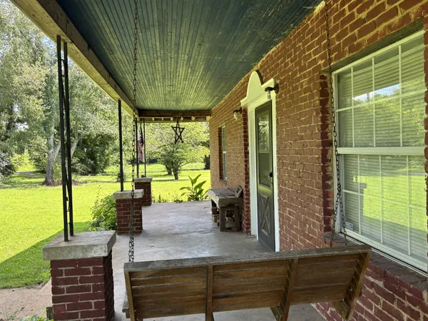 a view of a room with a large window