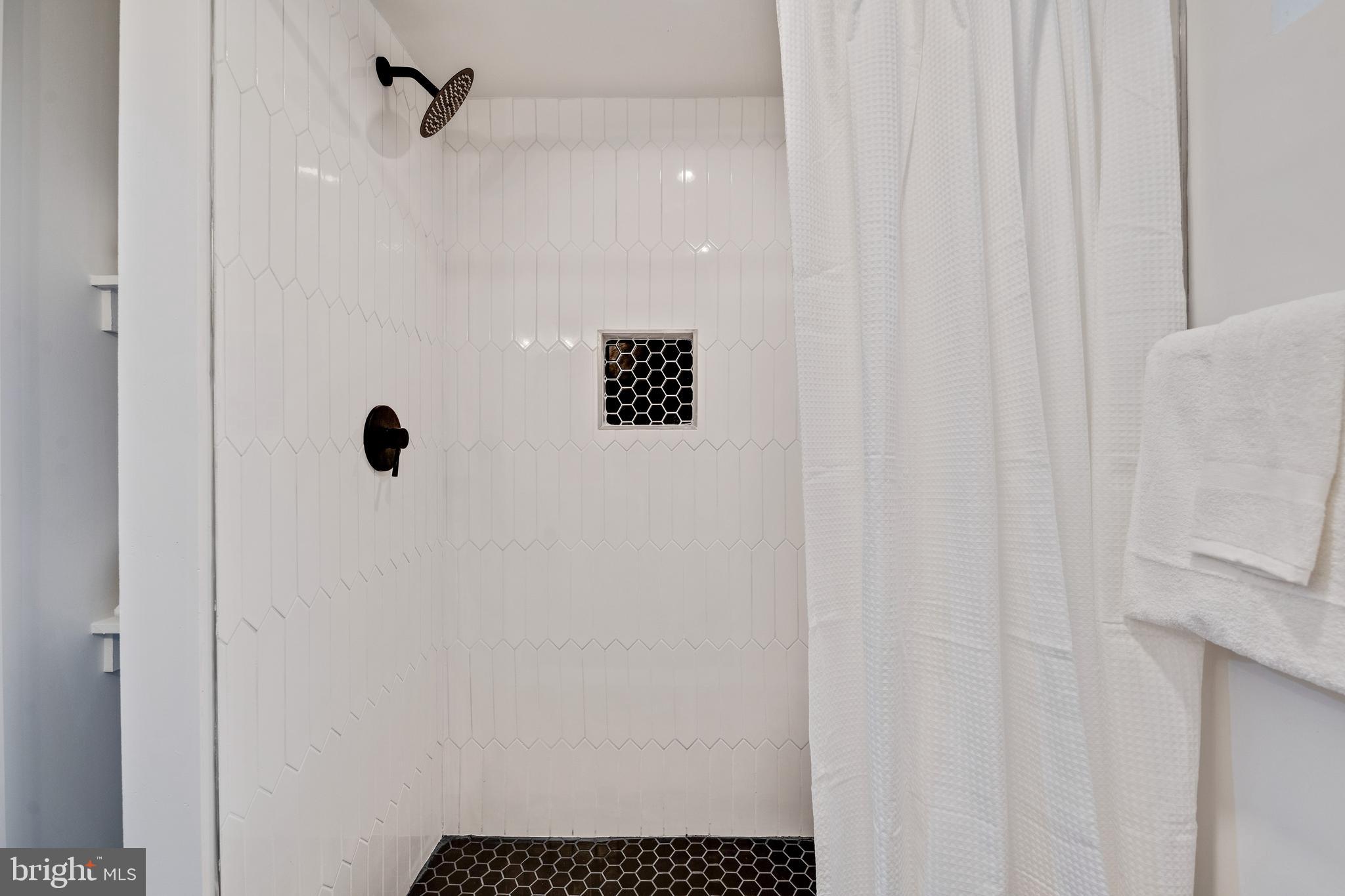 2001 Reuter Road Lutherville-Timonium, MD 21093 - Photo 30 of 38 Enjoy the oversized white & hex Custom Tile Shower