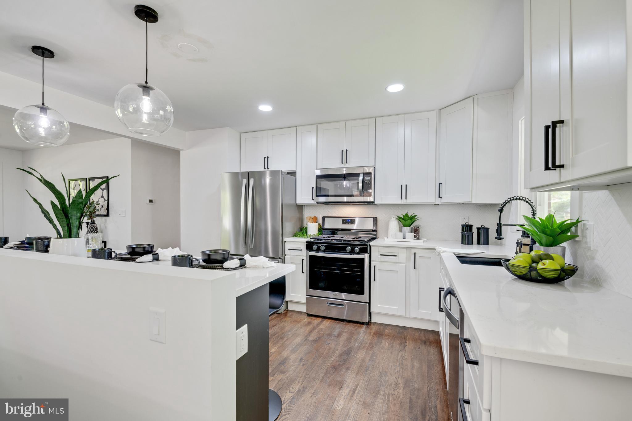 2001 Reuter Road Lutherville-Timonium, MD 21093 - Photo 10 of 38 Kitchen with Quartz Botanica Countertops